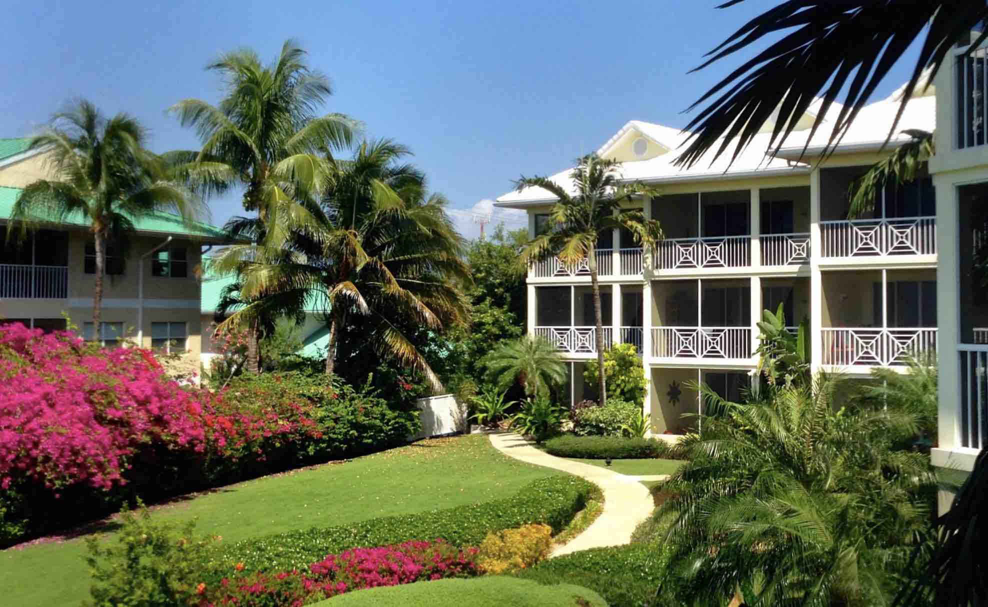 Luxury hotels in Cayman Islands include Crescent Point Resort exterior shown 