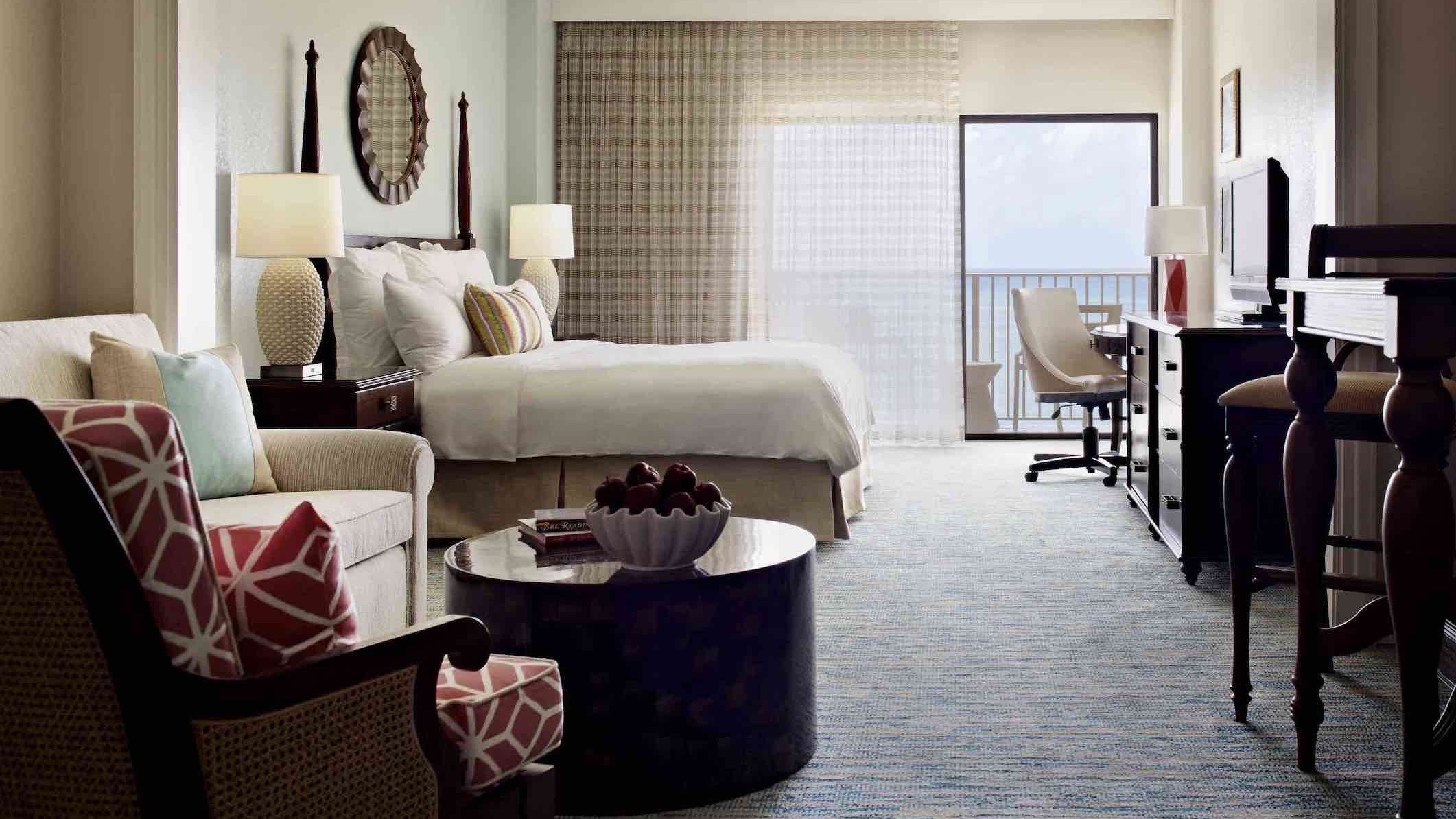 Grand Cayman Marriott Beach Resort bedroom with ocean view